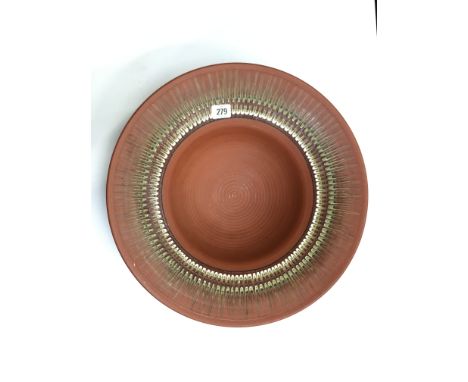 A Poole Pottery red bodied "One Off" Atlantis large bowl, the rim decorated in combed slip by Guy Sydenham (17 inches diamete