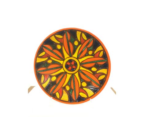 A Poole Pottery Delphis charger, shape 54 in a stylised early palette design, decorated by Lindsay Loader (16 inches).