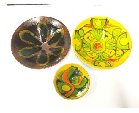 A Poole Pottery Delphis bowl, shape 57, decorated by Cynthia Bennett together with two other bowls.
