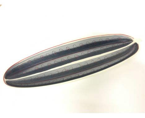 A Poole Pottery Freeform cucumber dish, decorated in the TNC design, painted by Diane Holloway together with two "Poole Potte