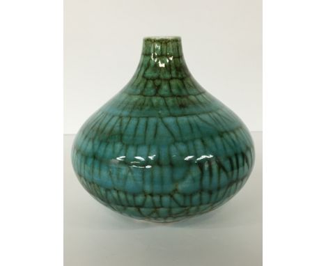 A Poole Pottery Studio vase, shape 10, of ovoid Onion form, shape designed by Robert Jefferson, cira 1963 - 66, decorated wit