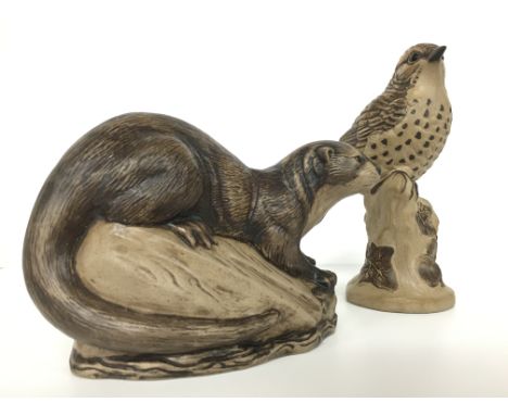 A Poole Pottery Barbara Linley Adams stoneware model of a Thrush together with an Otter.
