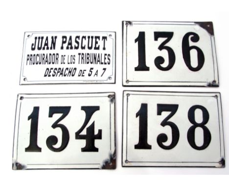 Group of enamel plaques with black lettering on white ground, one Spanish and three further plaques with numbers (4), largest