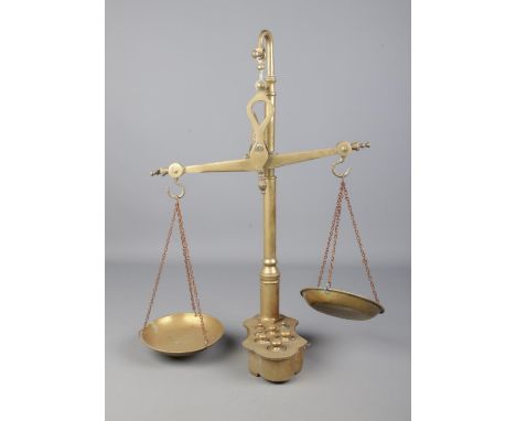 A set of DLC Italy brass balance scales with inset weights.