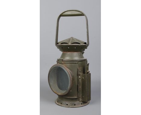 A C. Eastgate &amp; Sons, Birmingham military railway lantern. Bearing broad arrow mark to body and dated 1956. Height: 33cm.