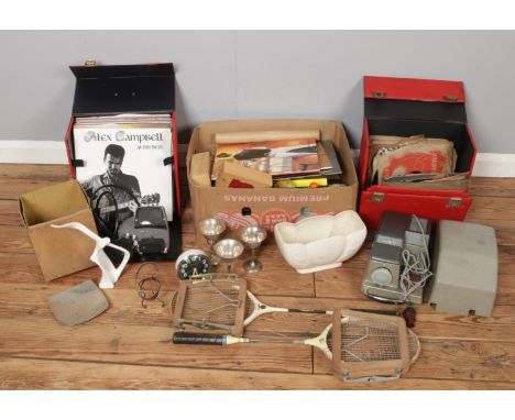A box of Miscellaneous, including two albums of vintage records, board games, wall decorations and projector etc
