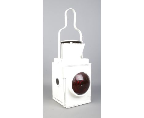 A British Railways (Western) tail lamp, white painted with red glass lens. Height: 52cm.