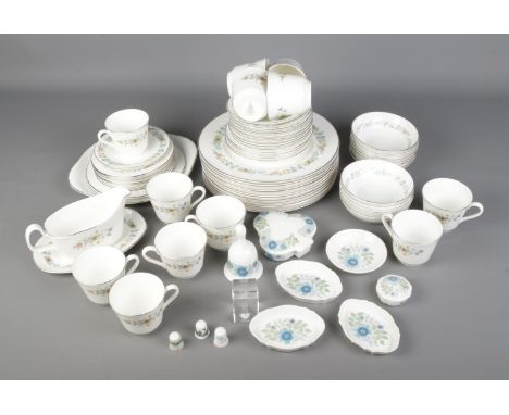 A Royal Doulton Pastorale tea service to include cups, saucers, plates, gravy boat, etc. Along with a small quantity of Wedgw