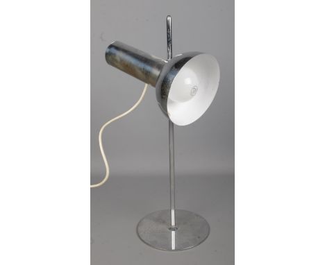 A Prova Italian adjustable chromed desk lamp.  Wiring is slightly loose in switch but is working.