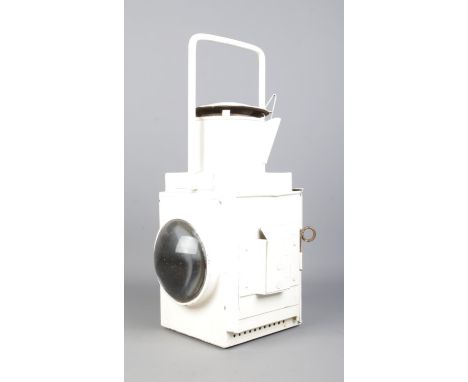 A large white painted railway lamp, with fixed handle. Featuring clear panel to one side and removeable red panel to the othe
