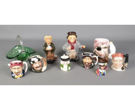 A tray of ceramic character jugs and a green glass basket, includes Royal Doulton Trapper D6612 example