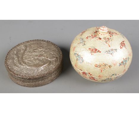 A white metal Chinese trinket box with interior vanity mirror with another small papier mache trinket box