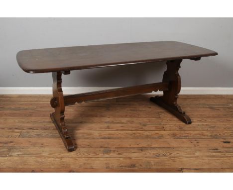An Ercol refectory dining table. 182x81cm