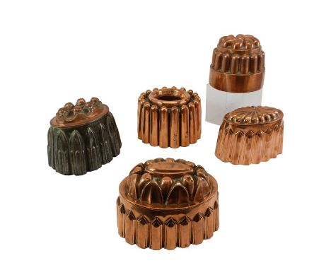 Four 19th Century copper jelly moulds, two with initials stamped S &amp; P - M H S and M R 295, plus another in copper and ti