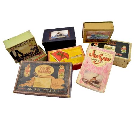 A selection of puzzles, including R.M.S. Berengaria, Cunard Atlantic travel, Chad Valley GWR 'Anne Hathaways Cottage' and Cha