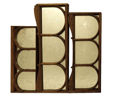 A Victorian sectional mirrored glass frieze, with mahogany framed arch glass panels with stylised foliate decoration, 85cm x 