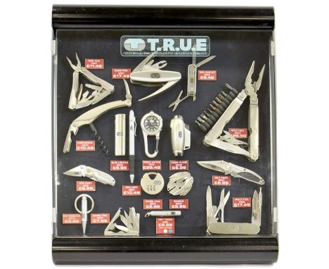 A 'Toe Rags Utility Equipment' display cabinet with contents, including penknives/multi-tools, height 42m, width 39.5cm, dept