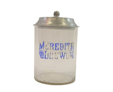 A glass barrel with aluminium lid marked MEREDITH &amp; DREW'S BISCUITS BY APPOINTMENT, the name acid etched and in blue colo