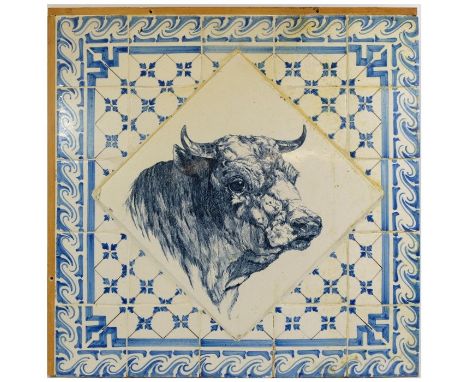 A Minton style Victorian butcher’s tile with printed blue decoration depicting a bulls head, the tile mounted on a blue print