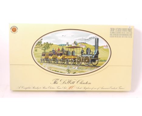 A Bachmann HO Gauge American 'De Witt Clinton' Train Pack, including the early De Witt locomotive and tender with three 'stag
