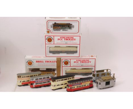 Model Trams in OO and HO Gauge by Bachmann and Others, including 3 Bachmann PCC cars, 1 Brill Trolley and 1 SF Cable Car in o