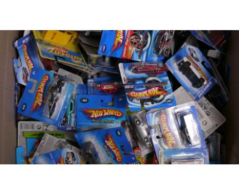 Hot Wheels, A collection of factory sealed 1:64 scale vehicles, 2000s, including private, competition and commercial models, 