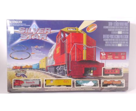 A Bachmann HO Gauge American 'Silver Star' Train Set, with Santa Fe Diesel locomotive and freight stock, 'E-Z track' (figure 