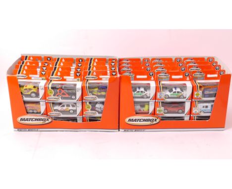 Matchbox, A group of five complete trade boxes,2000s, with factory sealed 1:64 scale models, comprising, Mattel Wheels (36), 