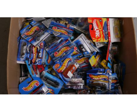 Hot Wheels, A collection of factory sealed 1:64 scale vehicles, 2000s, including private, competition and commercial models, 