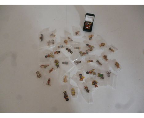 Collection of modern Robertson's enamel Golly badges, including Golly with Reindeer, in original box and 38 other Golly badge