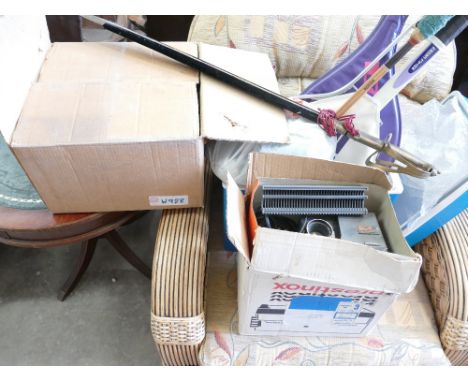 A mixed collection of items to include boxed games: tennis and squash rackets, prestinox projector etc