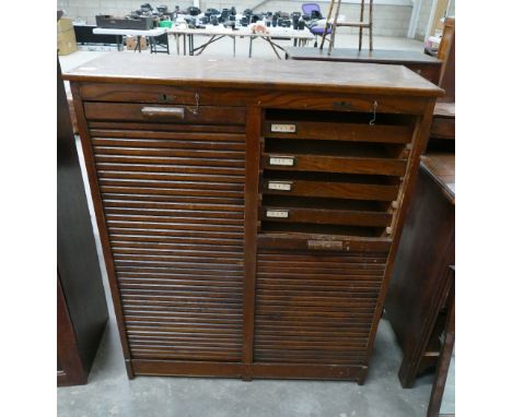 1920's Oak Double Roller Shutter Filing Cabinet: with fitted drawers, height 107cm, width 92cm and depth 37cm