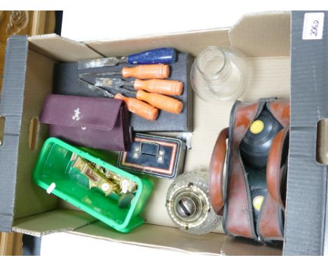 A mixed collection of items to include Thomas Taylor bowls: Glass oil lamp, miniture brass clocks, chisels etc (1 tray)