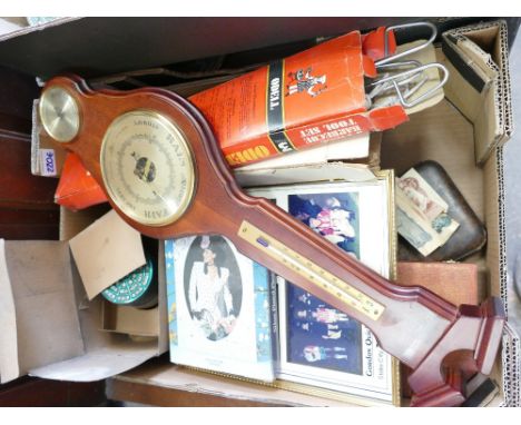 A mixed collection of items to include a wooden barometer: vintage face mask, boxed manicure set, old £5 note and a 10 shilli