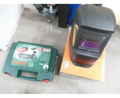 A Bosch PMF180E10 sander: together with Impax welding helmet