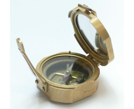 Modern brass marching compass bearing name of Stanley