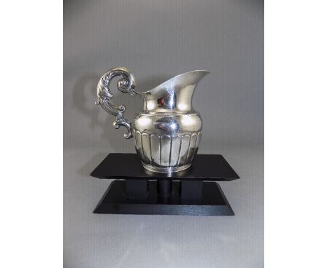 Swedish Early 19th Century Helmet Shaped Silver Milk Jug with Very Stylish Handle and Half Ribbed Body. Date 1849. Makers Mar