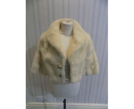 Blonde Mink Shrug. Fully lined with two button fastening to front. No Label to interior. Approx size 10-12. Very good conditi