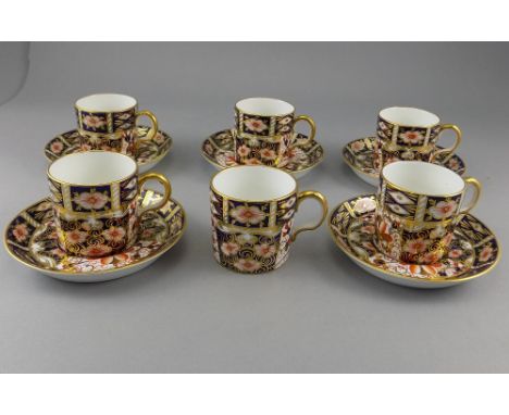 Royal Crown Derby Imari Pattern Set of 6 Coffee Cups and 5 Saucers. Pattern number 2451. Date 1924. 1 saucer damaged. 10 piec