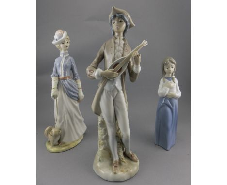 3 Spanish Porcelain Figures Comprising Lladro Nao Daisa 1990, Tengra Lady With Dog And A Cascades Gentleman Playing Instrumen