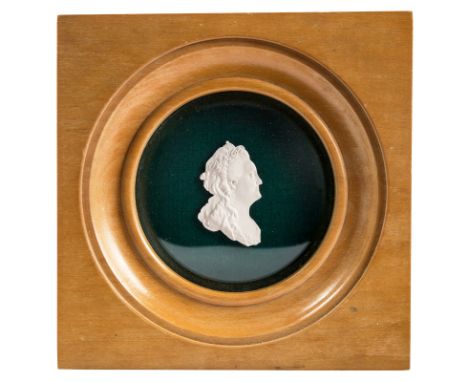 A RUSSIAN BISQUE CAMEO OF CATHERINE THE GREATrealistically carved, depicting the empress in profile, length: 47 mm (1 7/8 in.