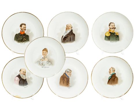 A RARE SET OF SEVEN CHARGER PLATES WITH CHARACTERS FROM GOGOLS DEAD SOULS, KUZNETSOV PORCELAIN MANUFACTORY, MOSCOW, EARLY 20T