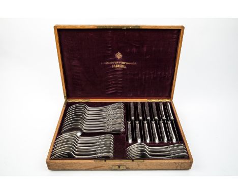 A SET OF DINNER SPOONS, KNIVES AND FORKS FOR 12 PEOPLE IN AN ORIGINAL LINED WOODEN CASE, MARKED SAZIKOV WITH AN IMPERIAL WARR