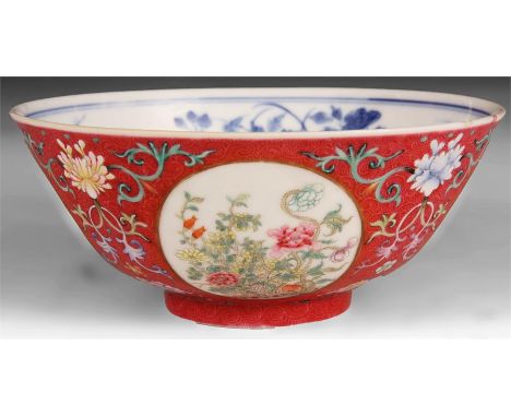 A CHINESE DAOGUANG PERIOD MEDALLION BOWL the deep pink fine scroll work and flower spray exterior enclosing floral medallion 