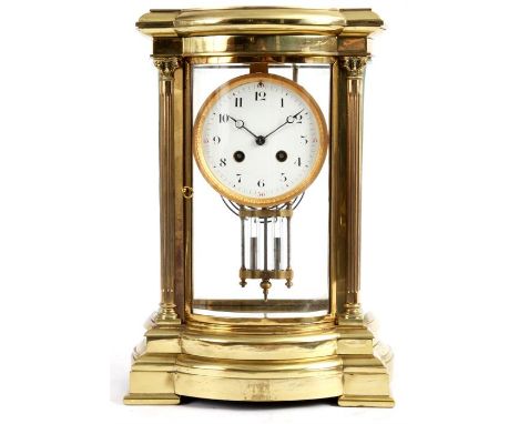 A LATE 19TH CENTURY FRENCH LACQUERED BRASS FOUR GLASS MANTEL CLOCK with bowed front and sides, reeded Corinthian column corne