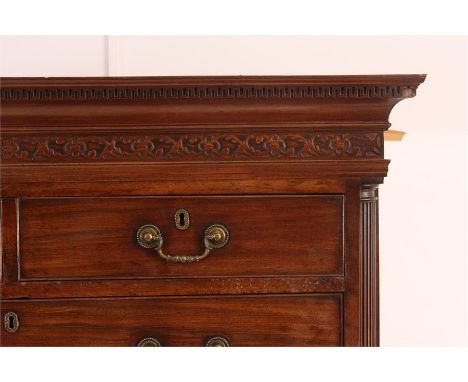 A GEORGE III FIGURED MAHOGANY LANCASHIRE CHEST ON CHEST OF SMALL SIZE with canted reeded quarter columns, moulded blind frett