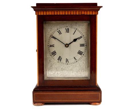 A LATE 19TH CENTURY FRENCH MAHOGANY AND BOX-WOOD STRUNG FOUR GLASS MANTEL CLOCK of small size, the stepped moulded edge top a