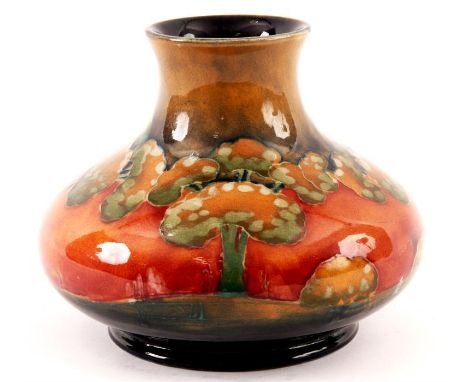 A WILLIAM MOORCROFT SQUAT BULBOUS CABINET VASE CIRCA 1920'stube lined and decorated in the EVENTIDE pattern with a continuous