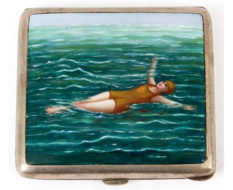 AN EARLY 20TH CENTURY WHITE METAL AND ENAMEL CIGARETTE CASE having hinged lid with enamel picture of a lady swimming in the o