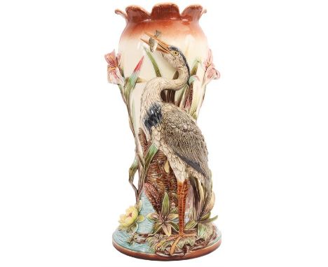 A LARGE 19TH CENTURY MAJOLICA STICK STAND with a heron fishing on a floral ground 56cm high